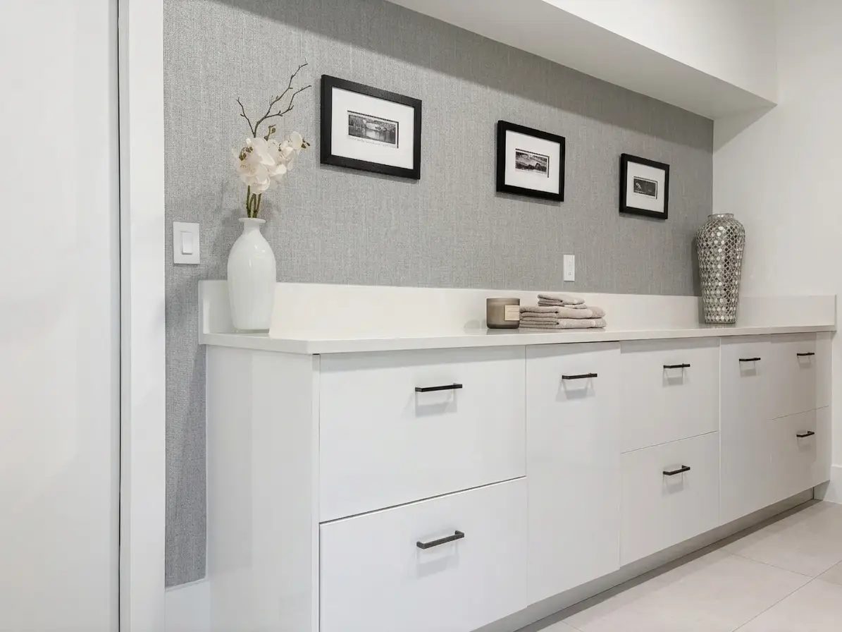 Laundry room with dual stacked washer and dryer